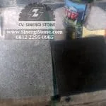 Batu andesit coating hitam (candi)