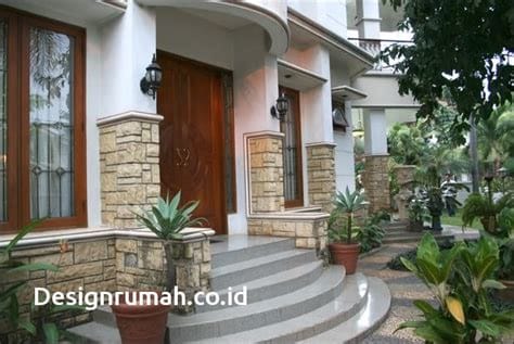 lihat desain rumah batu alam teras minimalis terbaru