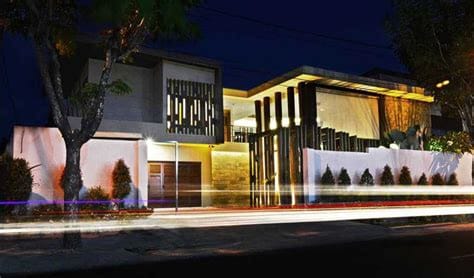 material batu alam tampak depan rumah minimalis