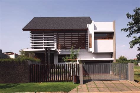 material batu alam tampak depan rumah minimalis