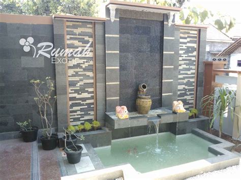 desain kolam ikan taman minimalis batu alam