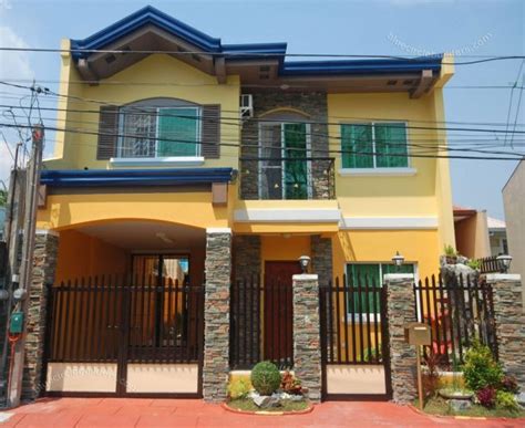 desain pagar batu alam minimalis terbaru renovasi
